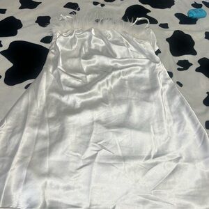 White silk dress with feathers